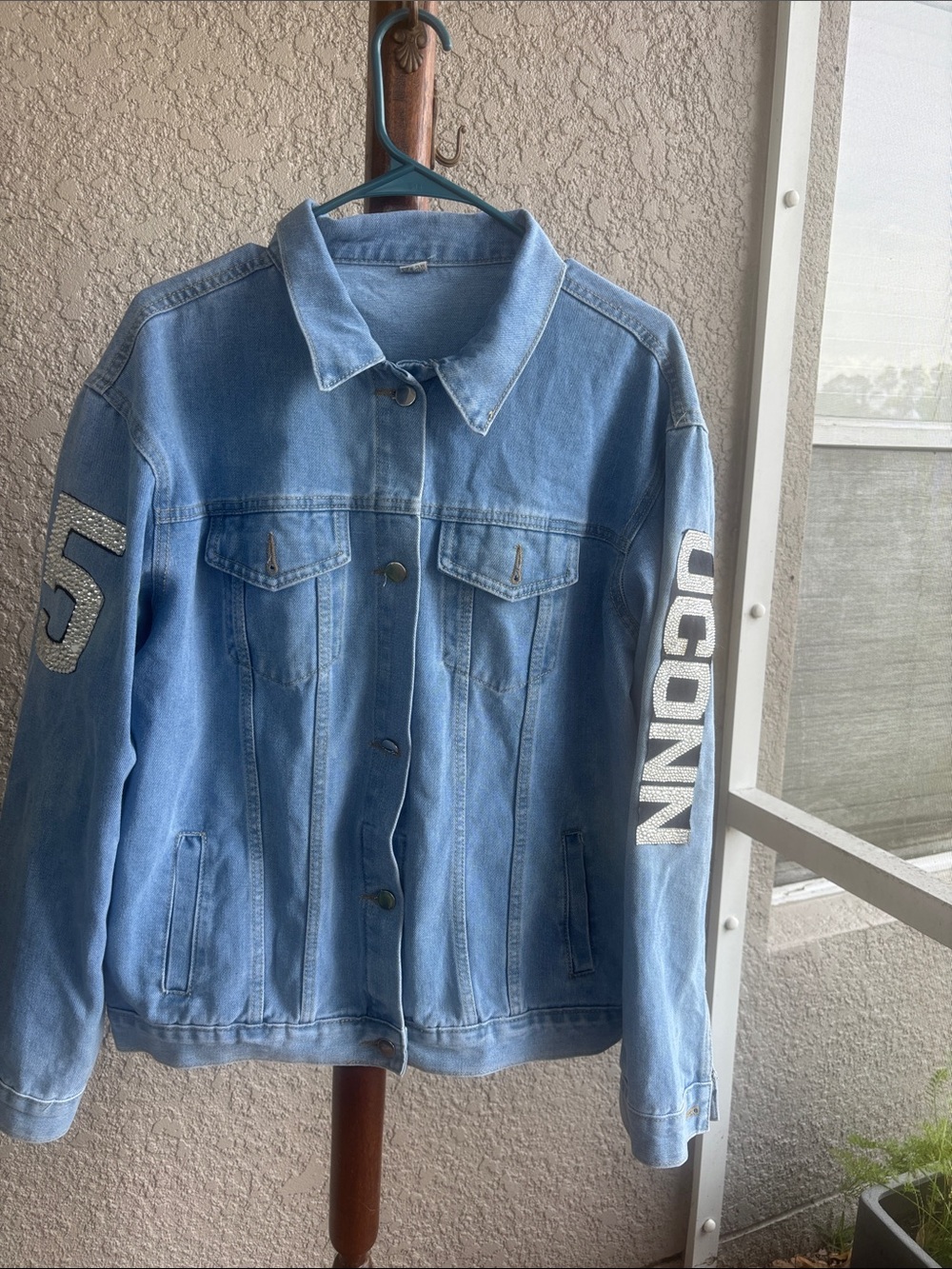 Light Blue Denim Jacket with UCONN Sleeve Detail